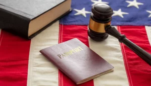 Can an e2 visa holder apply for a green card